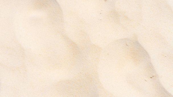 schöner Hintergrund und Textur, voller Rahmen aus feinem Sand am Strand Hintergrund. - Foto, Bild