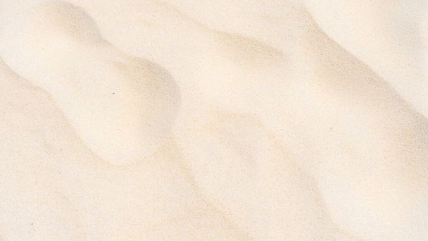 Gyönyörű strand homok textúra a strandon, mint a háttér - Fotó, kép