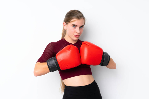Sport teenager girl over isolated white background with boxing gloves - Foto, imagen