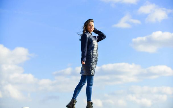 Pure beauty. woman enjoying weather outdoors. Freedom and expectation. Beauty and fashion, look. concept of loneliness. woman on blue sky background. woman in model pose outdoors. feel free - Фото, изображение