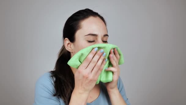 Close up sick young woman sneezing 4k - Filmati, video