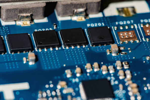 Electronic circuit board with processor, close up - Fotó, kép