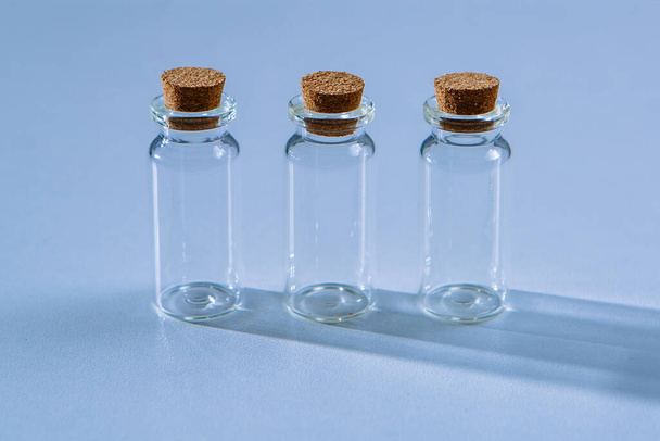 three empty beakers or test tubes - Foto, imagen