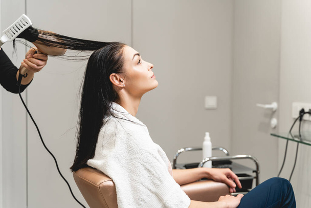Kind female person being in beauty salon - Photo, Image