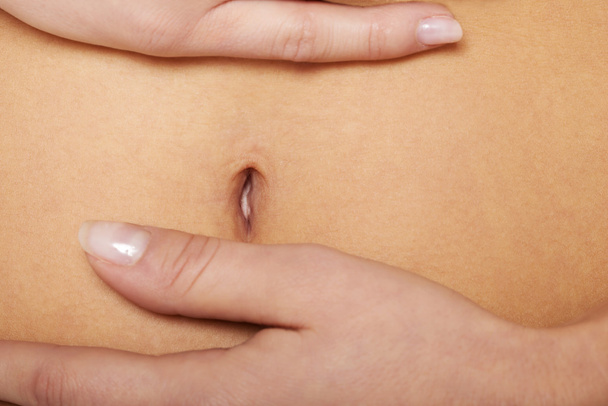 Close up on woman's flat belly. - Zdjęcie, obraz