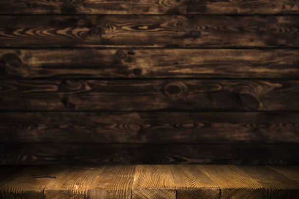 Beer barrel with beer glasses on a wooden table. The dark brown background. - Fotó, kép