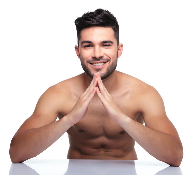 young naked beauty man making a house with his hands - Photo, Image