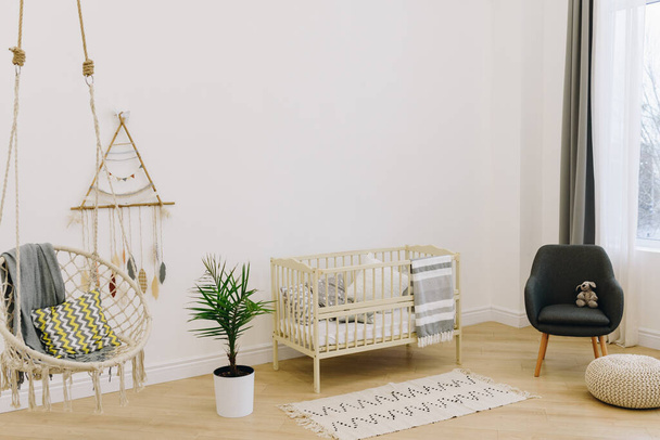 Cozy nursery decorated in subtle pastel colors - Photo, Image