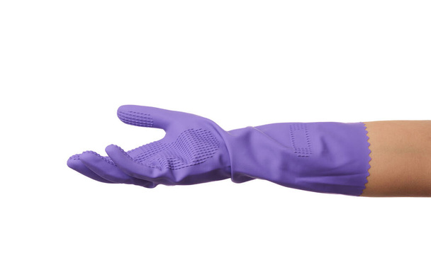 фіолетова гумова рукавичка для прибирання одягнена на його руку, його долоня відкрита і умовно тримає предмет
 - Фото, зображення