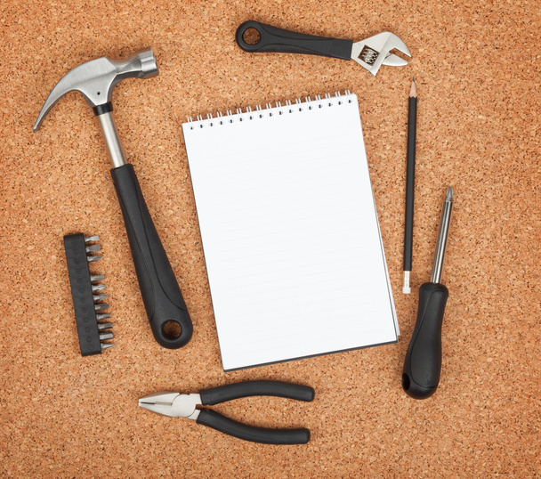Set of tools on cork background - Photo, image