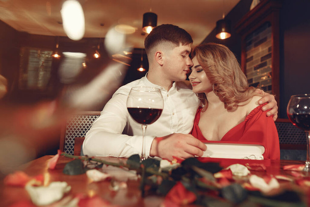 Elegant couple spend time in a restaurant - Fotó, kép