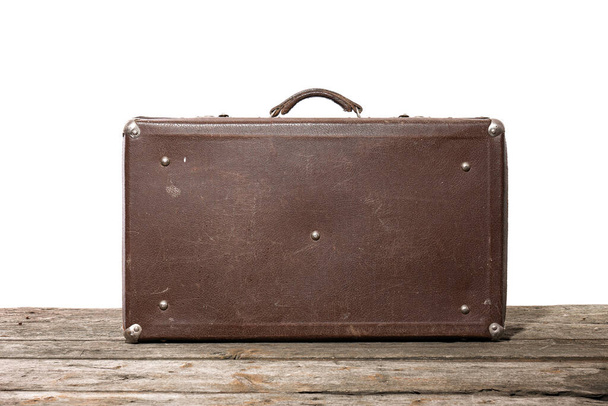 Old brown used and weathered suitcase isolated on white background - Photo, Image