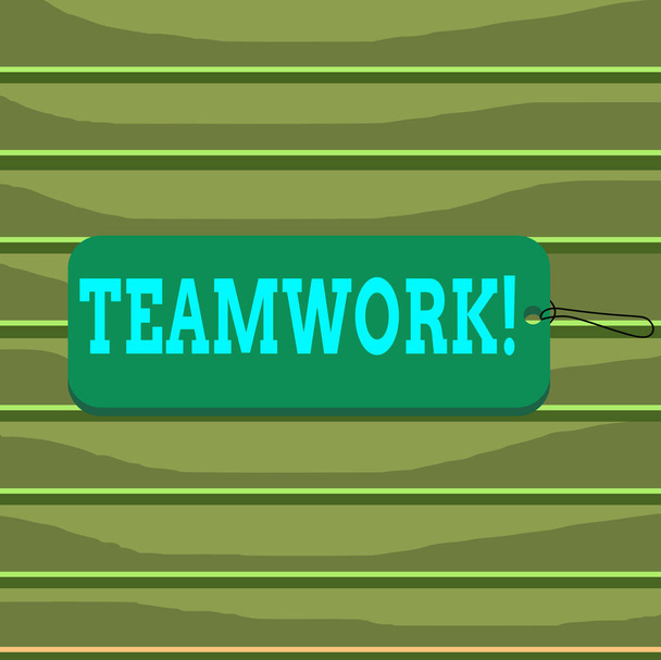 Conceptual hand writing showing Teamwork. Business photo text combined action of group especially when effective and efficient Label tag badge rectangle shaped string colorful background. - Photo, Image