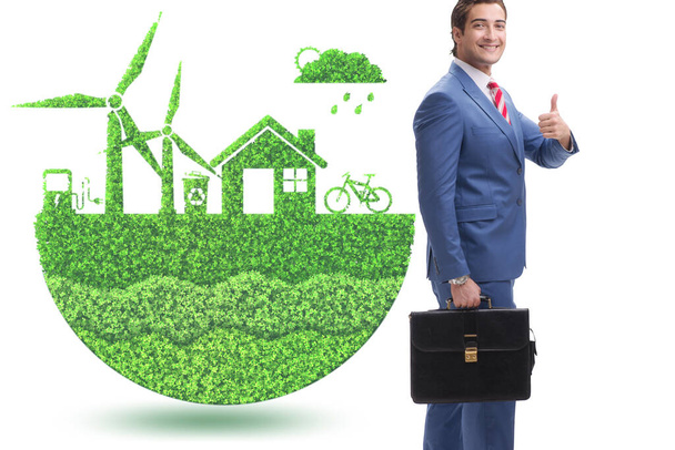 Zelená energie anc ekologie koncept s podnikatelem - Fotografie, Obrázek