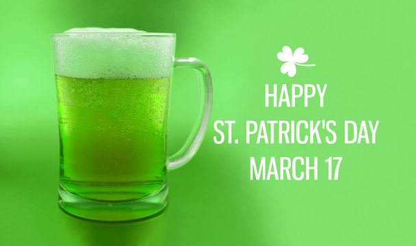 Happy Saint Patrick's Day with green beer. Glass of green beer. St. Patricks Day Poster, March 17. Important day - Foto, imagen