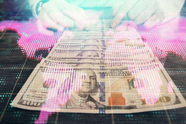 Multi exposure of financial theme drawing hologram and USA dollars bills and man hands. Business concept. - Valokuva, kuva