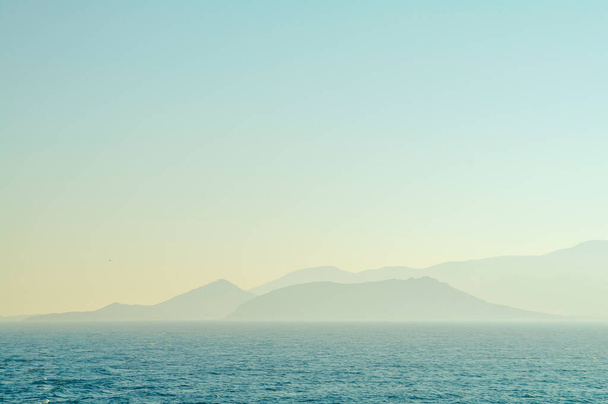 blue sea wave  and  blue sky with small island  - Fotografie, Obrázek