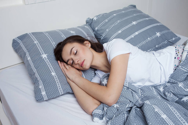 Night healthy sleep in bed, beautiful young brunette woman sleeping - Photo, image