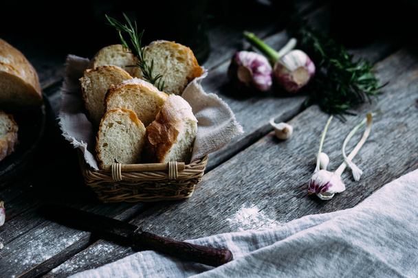 Wheat flour bread on the table - Foto, imagen