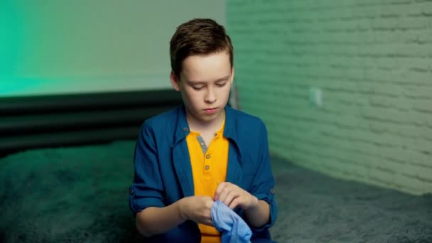 Boy wearing a protection gloves. Environmental and health concept. Protection against covid 19. - Video