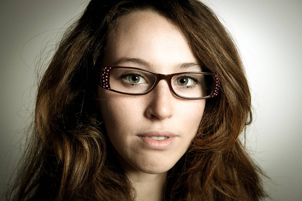 Model woman with makeup and accessories in combination with trendy eyeglasses and hairstyle - Foto, immagini