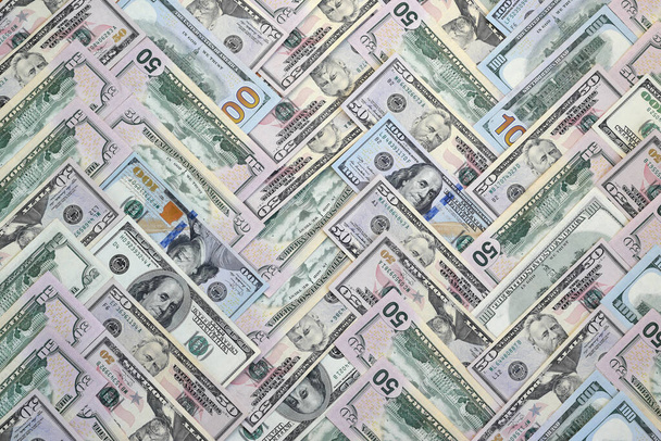 Sok százötven dolláros bankjegyek lapos háttér felületen közelről. Lapos fekvésű felülnézet. Absztrakt siker vagy üzleti koncepció - Fotó, kép