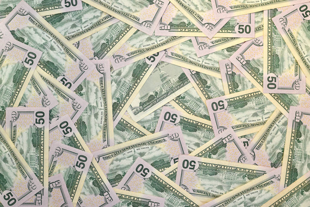 Mnoho amerických padesátidolarových bankovek na plochém podkladu zblízka. Plochý výhled shora. Abstraktní úspěch nebo obchodní koncept - Fotografie, Obrázek