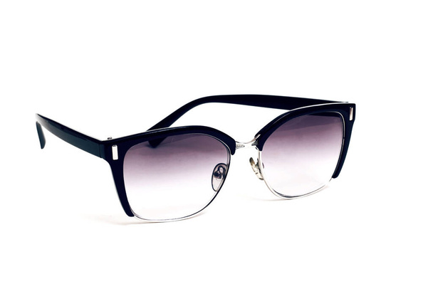 Black sunglasses isolated on a white background close up - Photo, Image