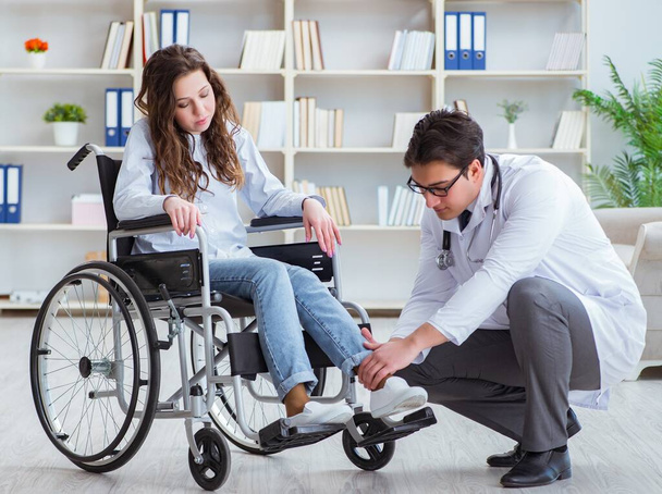 Disabled patient on wheelchair visiting doctor for regular check - Photo, Image