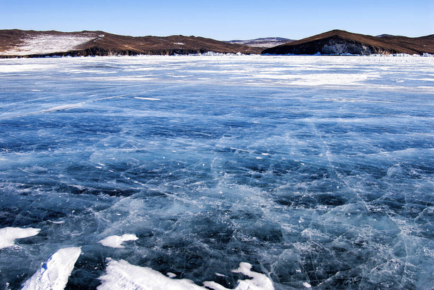 Amazing ice transparent ice on lake Baikal - Foto, afbeelding