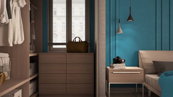 Minimal classic bedroom σε μπλε αποχρώσεις με walk-in ντουλάπα, διπλό κρεβάτι με πάπλωμα και μαξιλάρια, πλευρικά τραπέζια με λάμπες, φορέματα. Τοίχοι από παρκέ και στόκο, ιδέα πολυτελούς εσωτερικής διακόσμησης - Φωτογραφία, εικόνα