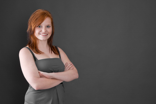 Red-haired girl with crossed arms - Foto, Bild