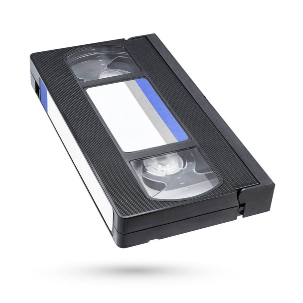 Zwarte VHS video cassette geïsoleerd op witte achtergrond - Foto, afbeelding
