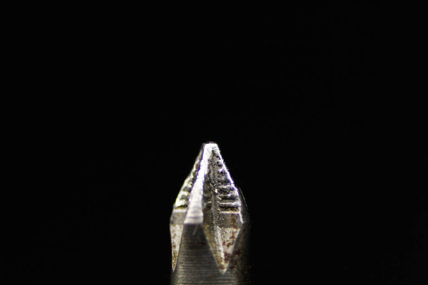 bit for a screwdriver on a black background - Φωτογραφία, εικόνα