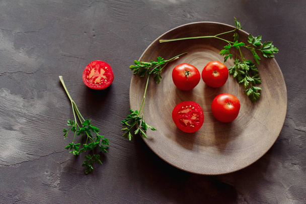 Tomatoes and parsley  for diet  vegetarian vitamin dinner - Φωτογραφία, εικόνα