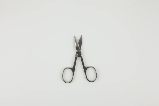 Scissors for manicure on a white background - Foto, Imagen