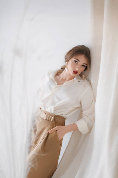 beautiful  young woman in white shirt and skirt - Φωτογραφία, εικόνα