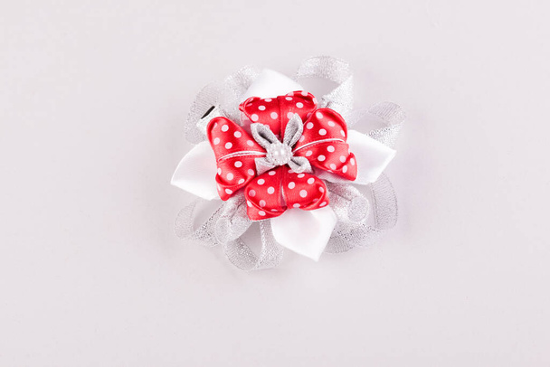 childrens hair brooch made of rat and white ribbons - Photo, Image