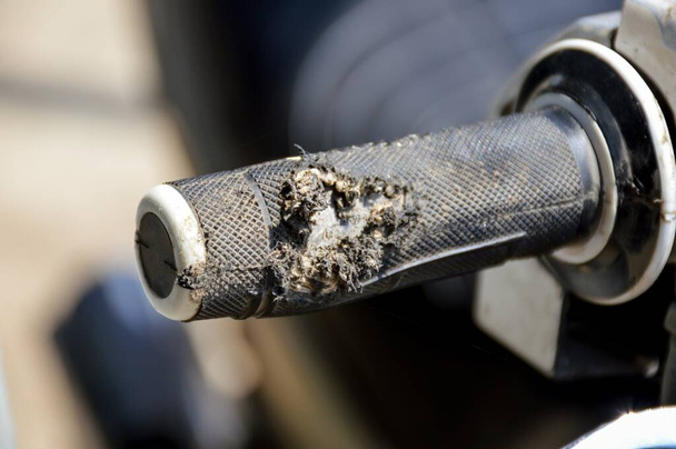 close up broken motorcycle handlebar after falling - Photo, Image