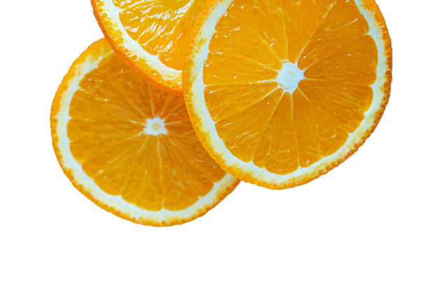 Grupa plastrów soku pomarańczowego. - Zdjęcie, obraz