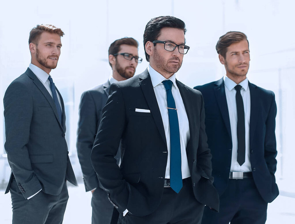 businessman and his business team standing in the office - 写真・画像