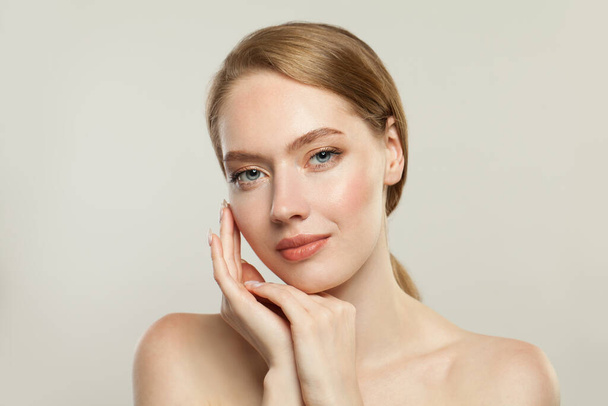 Beautiful face. Healthy model with clear skin. Skincare and facial treatment concept - Photo, Image