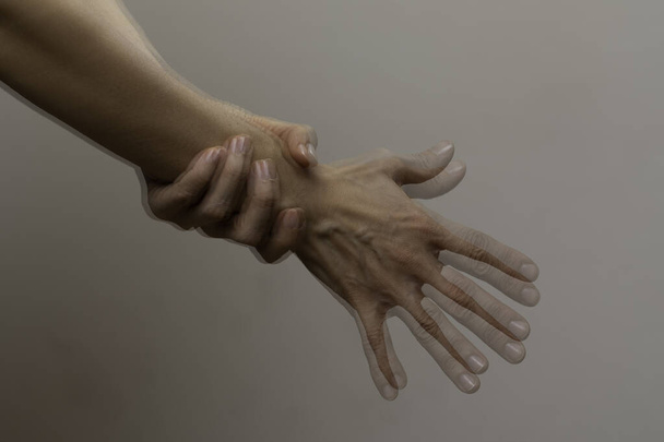 Trembling hand problem, nervous gesture - Foto, Bild