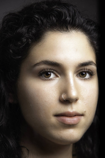 Beautiful young woman with nose piercing portrait - Photo, Image