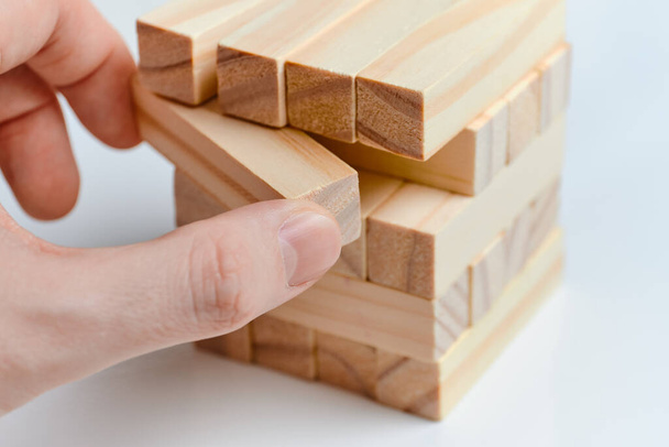 Remarketing concept. Wooden blocks on a white background background. Close up. - Photo, Image