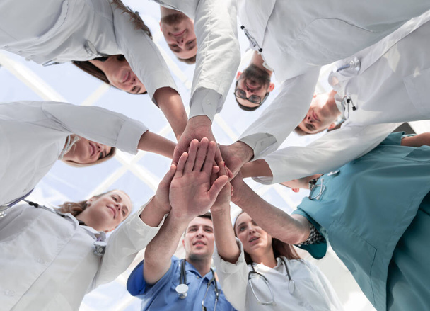 bottom view. diverse medical professionals showing their unity. - Photo, image