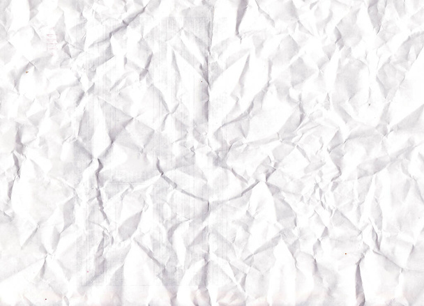 Witte gerecycled verkruimeld papier textuur achtergrond. Papierplaat met ruimte voor tekst of abstracte achtergrond. - Foto, afbeelding