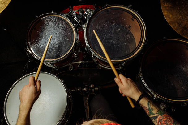 unrecognizable drummer playing on drum - Φωτογραφία, εικόνα