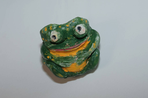 clay figurines of owls in scarfs and one of a frog - Photo, Image