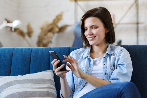 Stay home. Self isolation. Social media time. Spending time at home in quarantine period. Relaxation, leisure and stress management. Concept of young people working with mobile devices - Zdjęcie, obraz